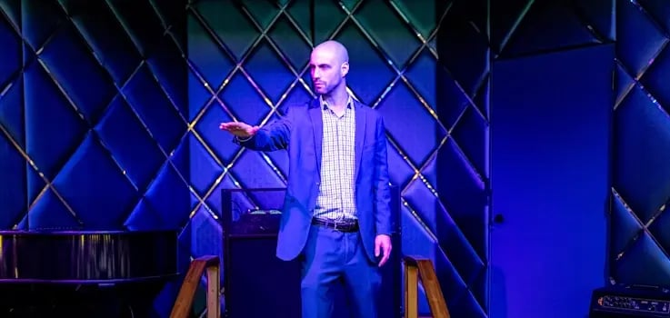 magician-and-mentalist-on-stage-WEBP-1
